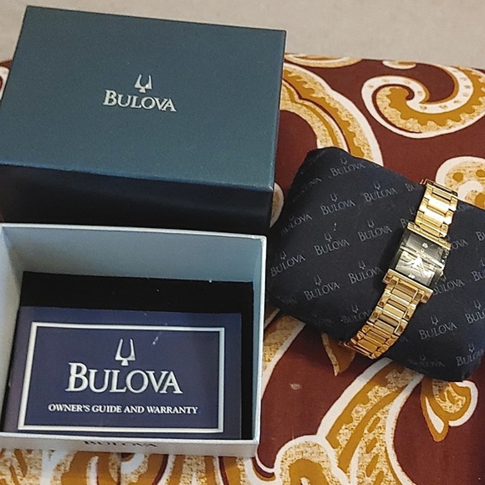 Bulova gold and black diamond Stainless Steel  woman's watch